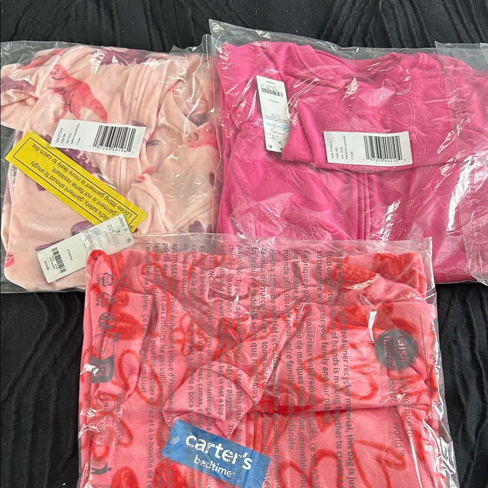 3 brand new Carter's girls pajamas!